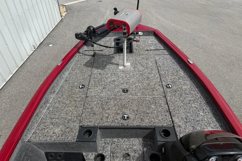 Slide: The Image of 2023 Pro Team 195 boat deck with red trim and mounted equipment. - 12