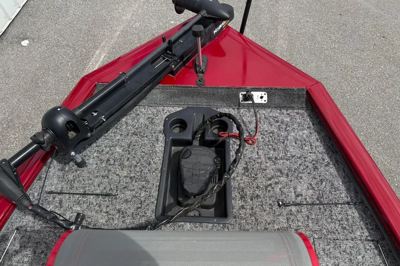 Slide: The Image of 2023 Pro Team 195 boat deck with trolling motor and control panel. - 14