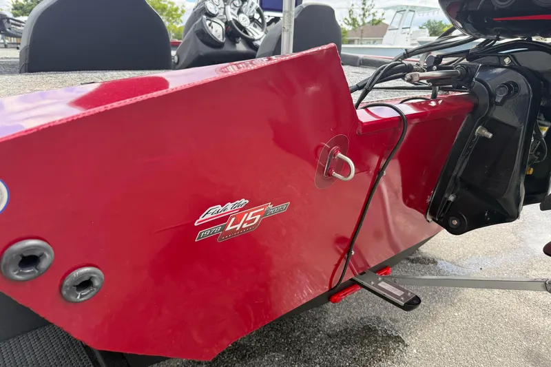 Slide: The Image of Red 2023 Pro Team 195 boat with Fish Rite 45th anniversary decal. - 7