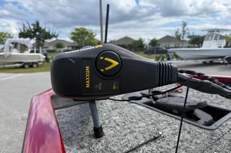 Slide: The Image of Minn Kota Maxxum trolling motor on 2023 Pro Team 195 boat, parked outdoors. - 9