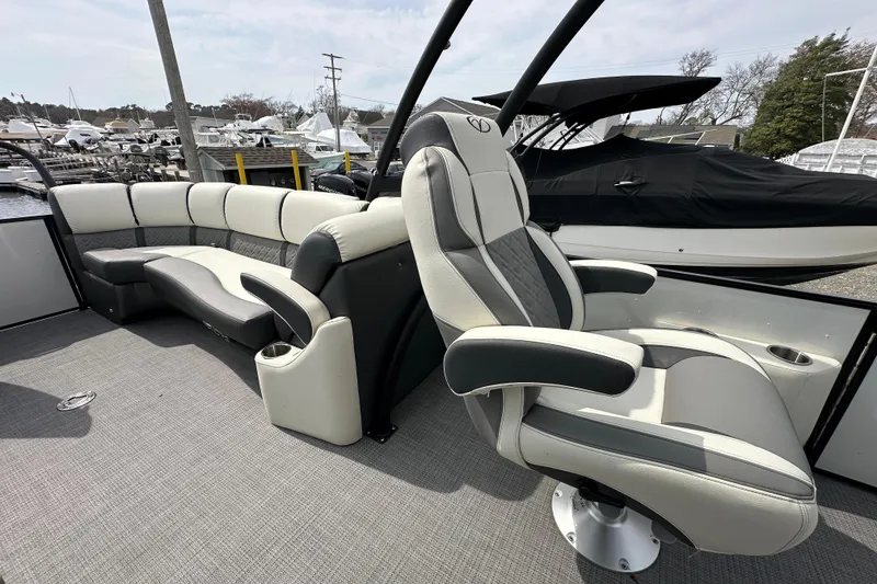 Slide: The Image of 2024 Veranda VP Tower 25 RCT pontoon boat with luxurious seating and modern design. - 26