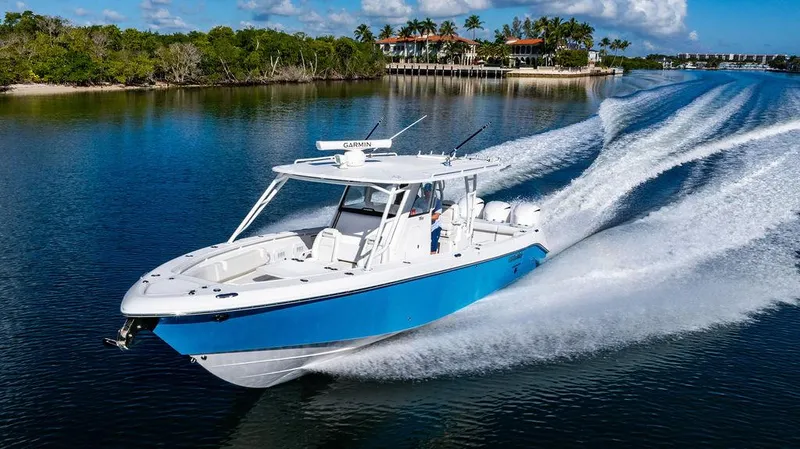 The Image of 2019 Everglades 355 Center Console cruising on calm waters. - 0