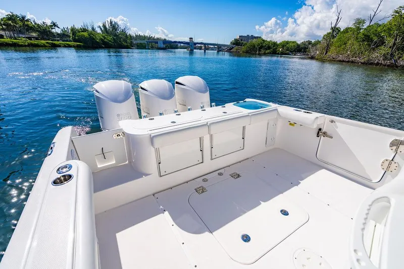 Slide: The Image of 2019 Everglades 355 Center Console on calm waters. - 24