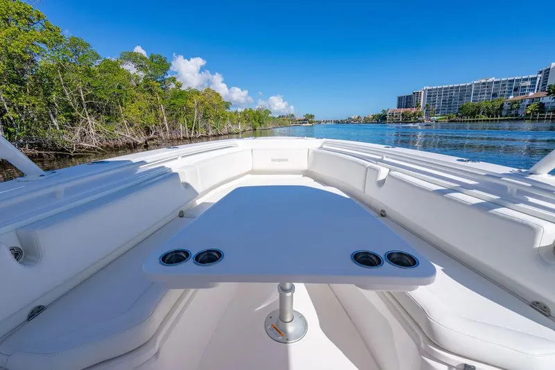 Slide: The Image of Everglades 355 Center Console 2019 on calm waters with blue sky. - 27