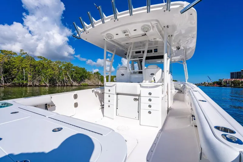 Slide: The Image of Everglades 355 Center Console 2019 on calm waters, sunny day. - 32