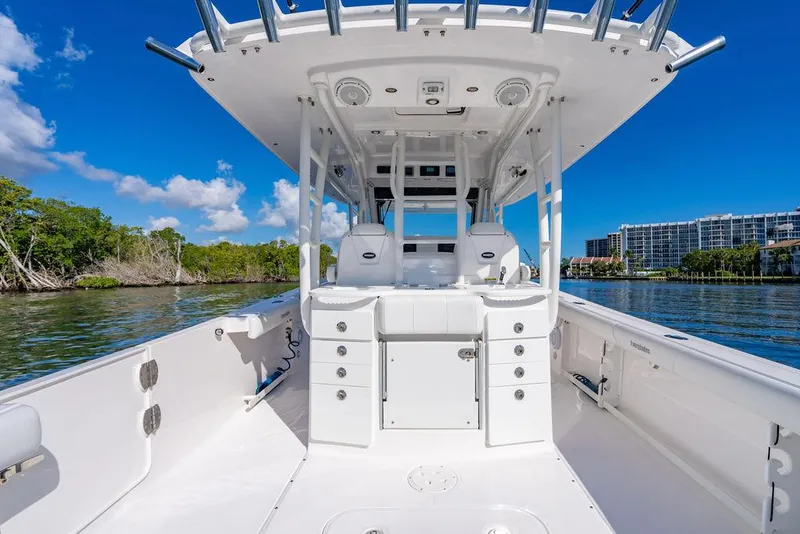 Slide: The Image of Everglades 355 Center Console 2019 on calm waters with blue sky. - 36