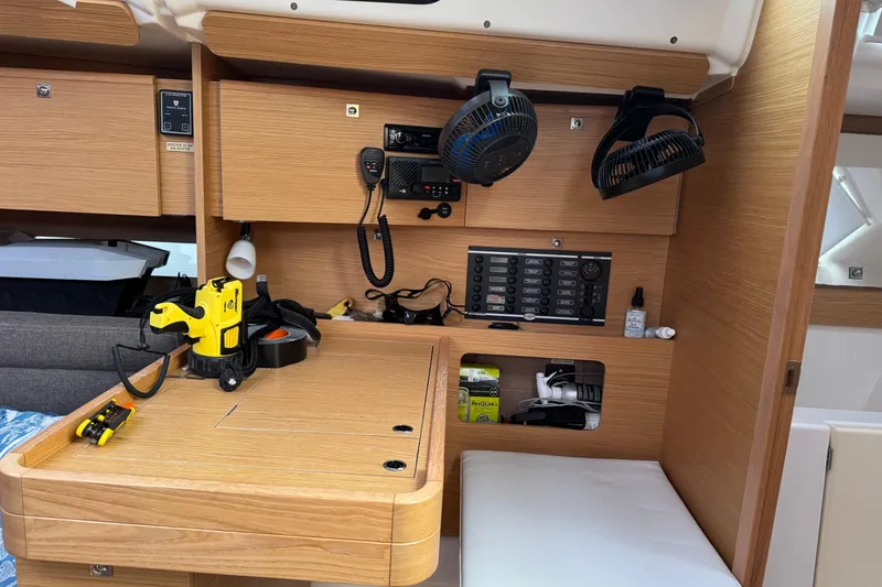 Slide: The Image of Interior of 2017 Dufour 350 Grand Large yacht with navigation equipment and storage. - 13