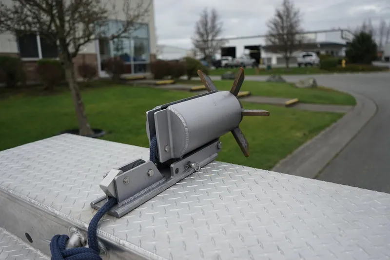 Slide: The Image of Aluminum boat anchor mount on Wooldridge 16 Alaskan LT, 2021 model, with blue rope. - 11