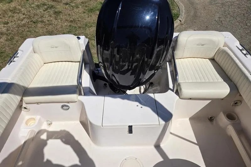 Slide: The Image of 2007 Grady-White Tournament 205 boat interior with seating and outboard motor. - 15