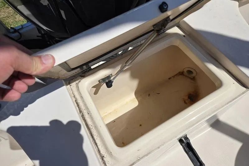 Slide: The Image of Open storage compartment on 2007 Grady-White Tournament 205 boat. - 19