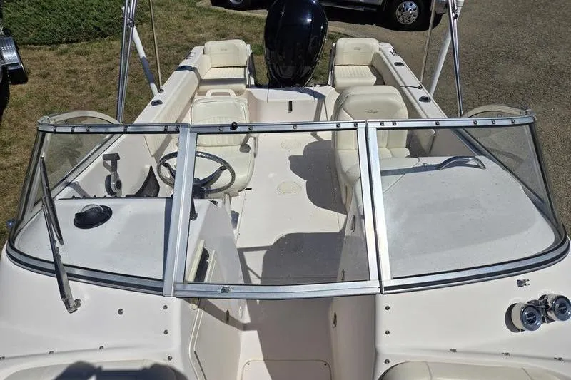 Slide: The Image of 2007 Grady-White Tournament 205 boat interior with seating and steering wheel. - 7