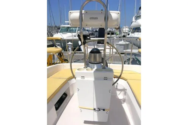 Slide: The Image of Steering wheel and cockpit of 2001 Catalina 310 sailboat, docked at marina. - 27