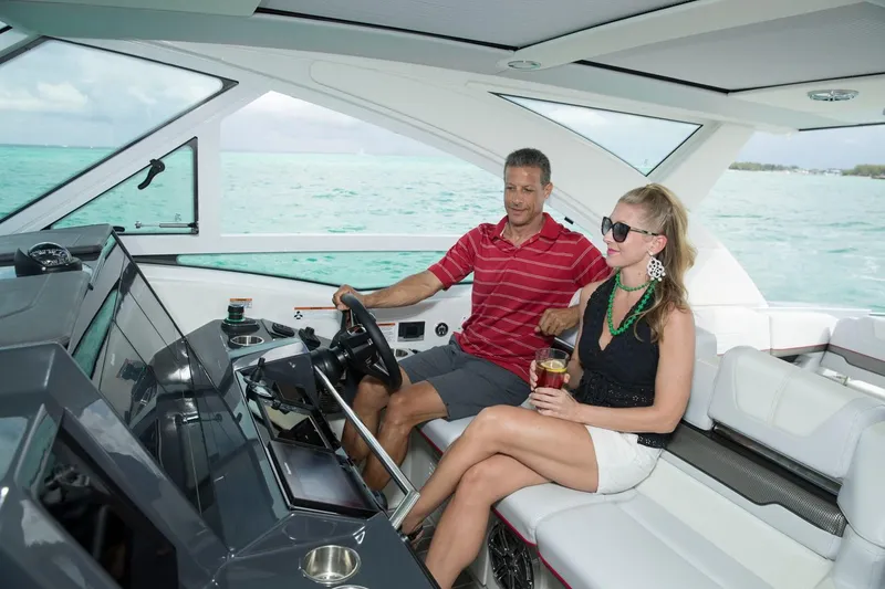 Slide: The Image of Manufacturer Provided Image: Couple enjoying a ride on a 2019 Formula 430 Super Sport Crossover yacht. - 10
