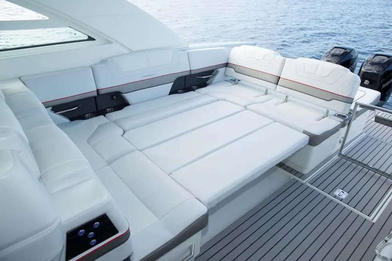 Slide: The Image of Manufacturer Provided Image: 2019 Formula 430 Super Sport Crossover yacht interior with luxurious white seating. - 12