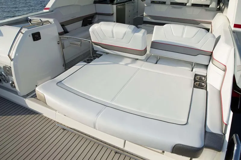 Slide: The Image of Manufacturer Provided Image: 2019 Formula 430 Super Sport Crossover boat interior with white cushioned seating. - 15