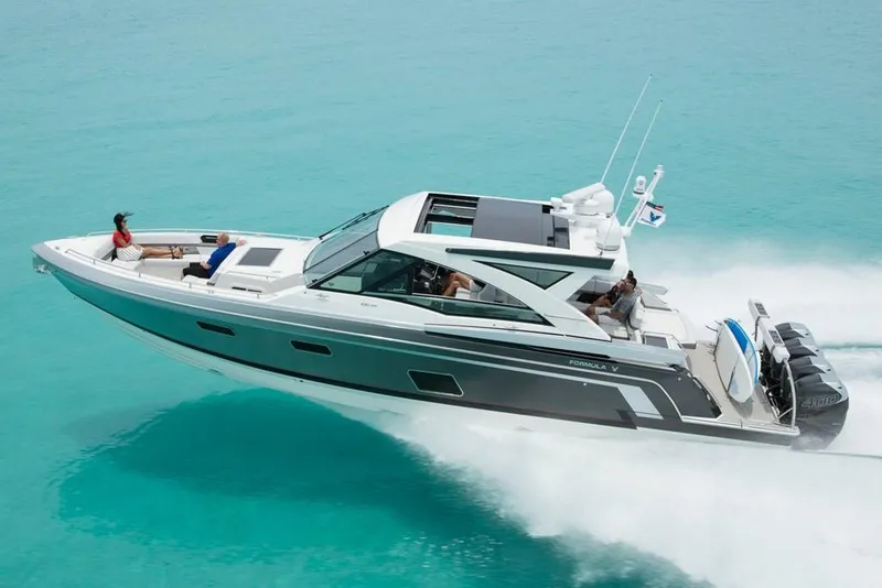 Slide: The Image of Manufacturer Provided Image: 2019 Formula 430 Super Sport Crossover cruising on clear turquoise water. - 3