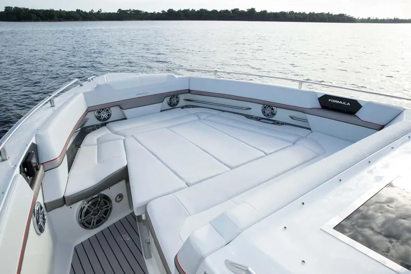 Slide: The Image of Manufacturer Provided Image: 2019 Formula 430 Super Sport Crossover boat with spacious seating area on calm water. - 9