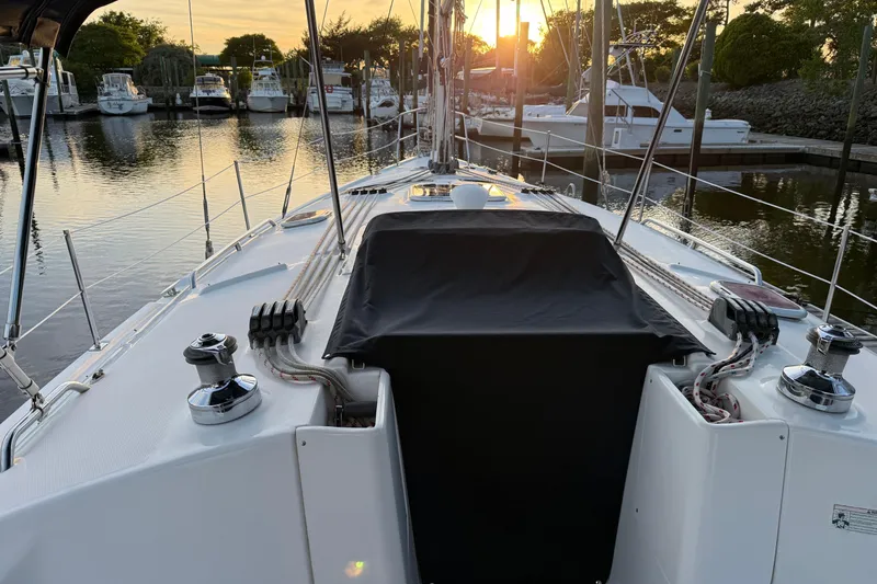 Slide: The Image of Sailboat deck view at sunset, Hunter 38 model, 2009, docked in marina. - 2
