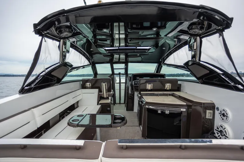 Slide: The Image of Luxurious interior of a 2019 Cobalt A36 boat with modern seating and amenities. - 15