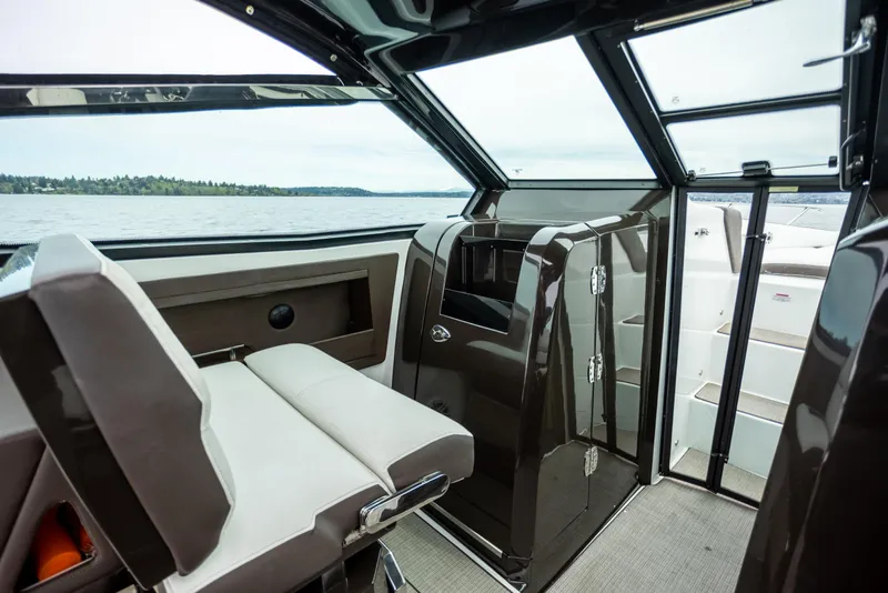 Slide: The Image of Interior view of 2019 Cobalt A36 boat, featuring sleek seating and modern design. - 19