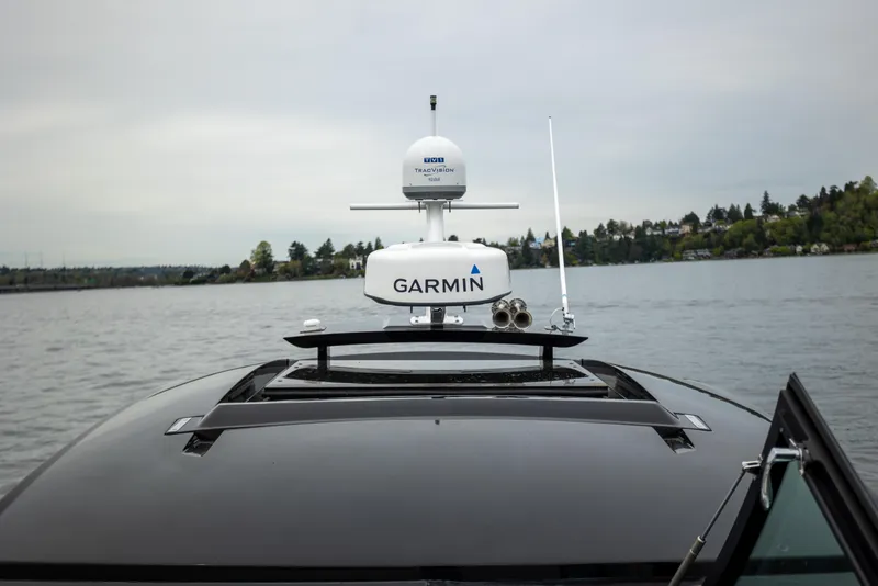 Slide: The Image of 2019 Cobalt A36 boat with Garmin radar on a lake. - 25
