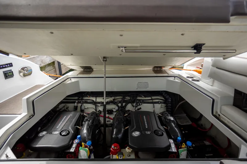 Slide: The Image of Engine compartment of a 2019 Cobalt A36 boat, showcasing dual inboard engines. - 31