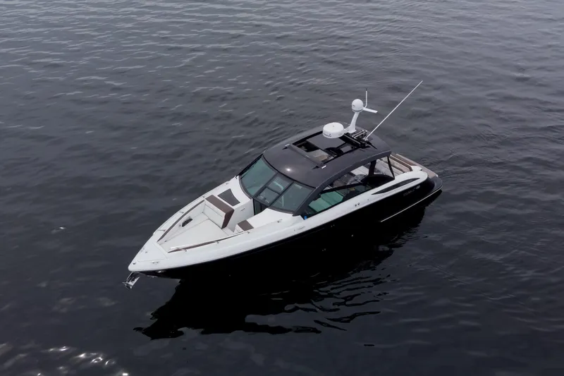 Slide: The Image of 2019 Cobalt A36 boat on calm water, aerial view. - 5