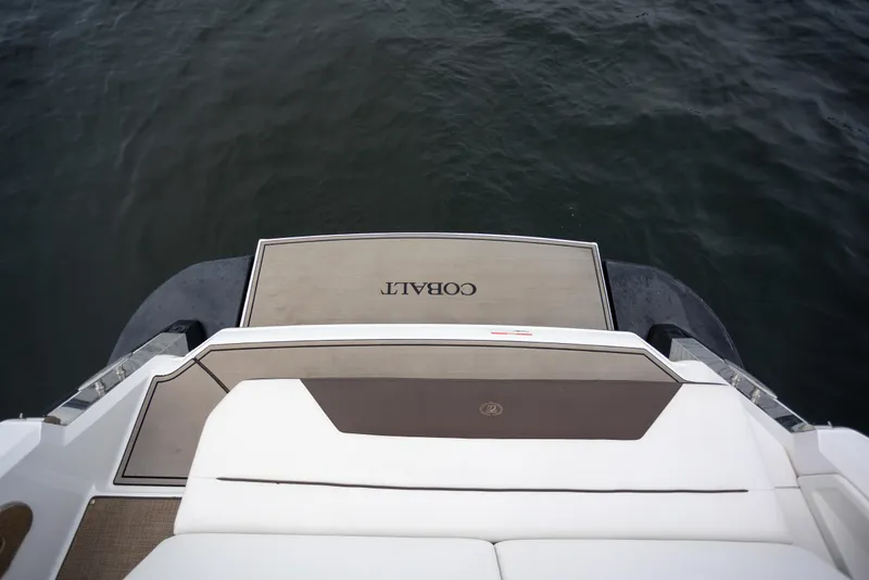Slide: The Image of 2019 Cobalt A36 boat swim platform overlooking calm water. - 6