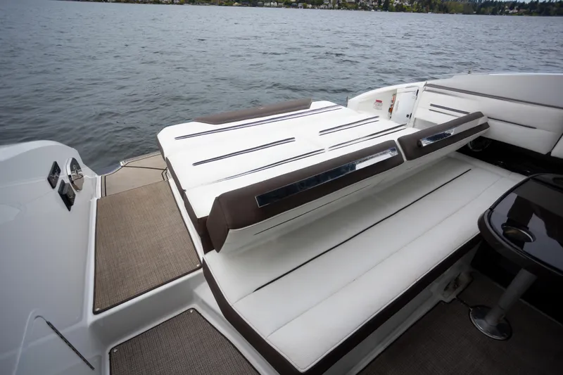 Slide: The Image of Luxurious seating on 2019 Cobalt A36 boat with lake view. - 9