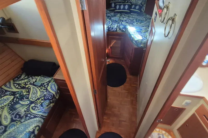 Slide: The Image of Cozy cabin bed with paisley bedding in 1983 Grand Banks 42 Motoryacht. - 23