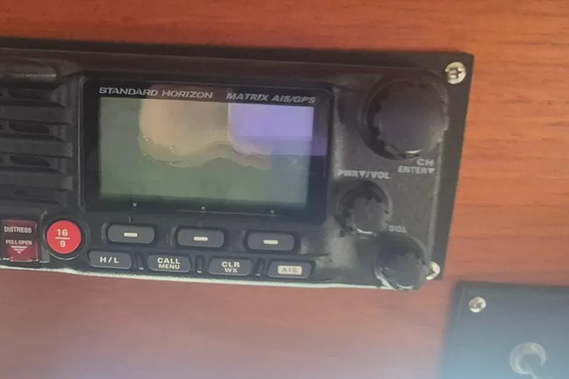 Slide: The Image of Interior of 1983 Grand Banks 42 Motoryacht with wooden paneling and nautical instruments. - 30