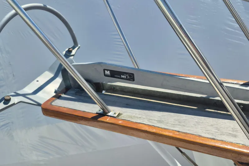 Slide: The Image of Deck of 1983 Grand Banks 42 Motoryacht with ropes and equipment. - 35