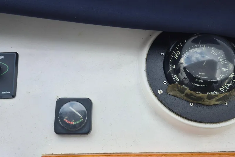 Slide: The Image of Garmin GPSMap XS display on 1983 Grand Banks 42 Motoryacht dashboard. - 48