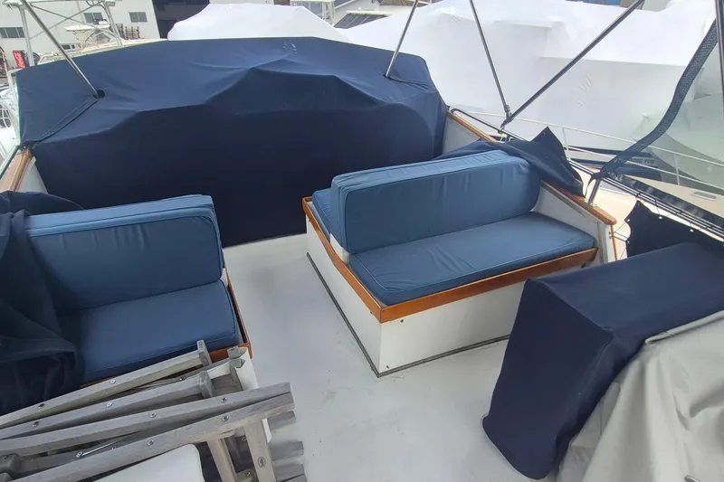 Slide: The Image of Dashboard of a 1983 Grand Banks 42 Motoryacht with gauges and compass. - 50