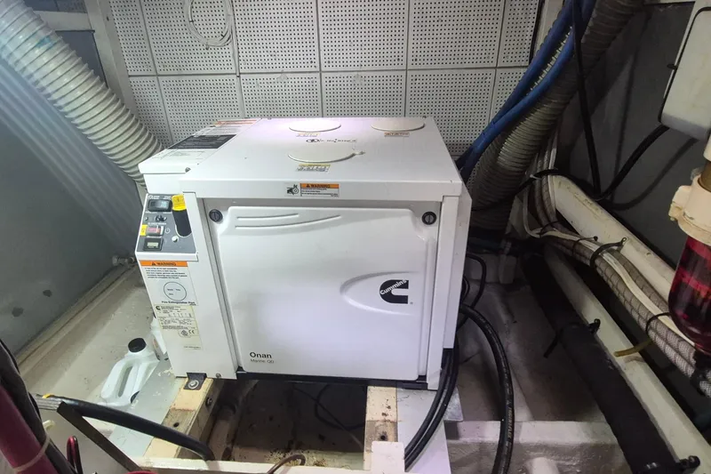 Slide: The Image of Ford engine data plate on 1983 Grand Banks 42 Motoryacht, showing specifications and serial number. - 59