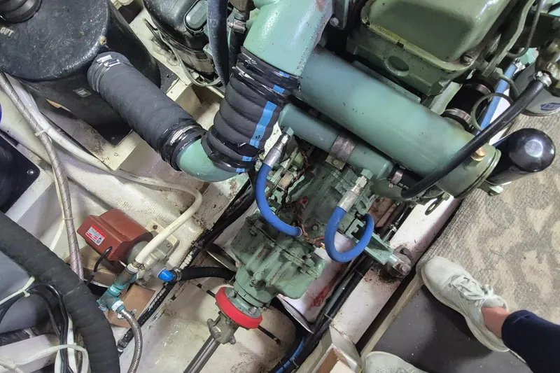 Slide: The Image of Cummins Onan generator in 1983 Grand Banks 42 Motoryacht engine room. - 60