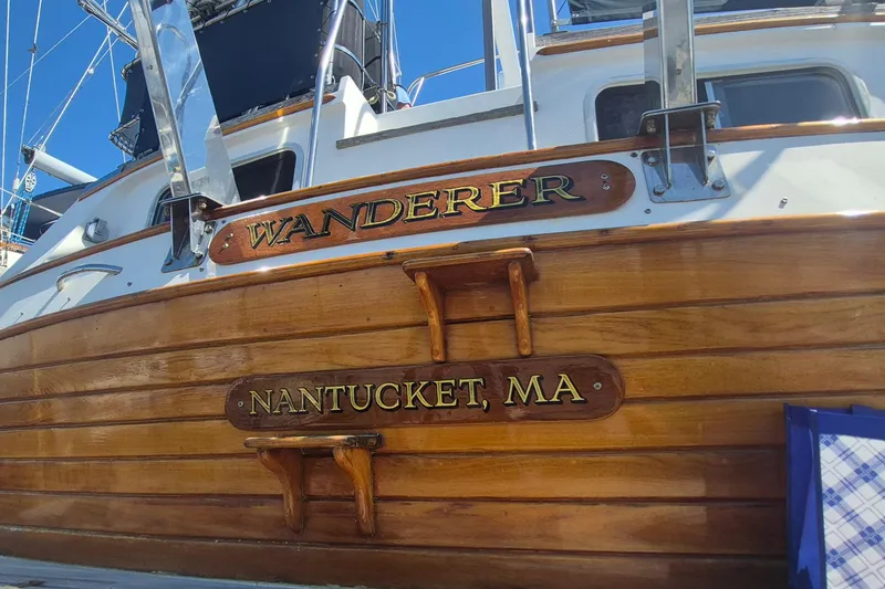 Slide: The Image of 1983 Grand Banks 42 Motoryacht hull in dry dock, showing blue paint and propeller. - 67