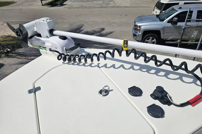 Slide: The Image of Control panel on a 2022 NauticStar 28 XS boat, featuring light switches. - 13