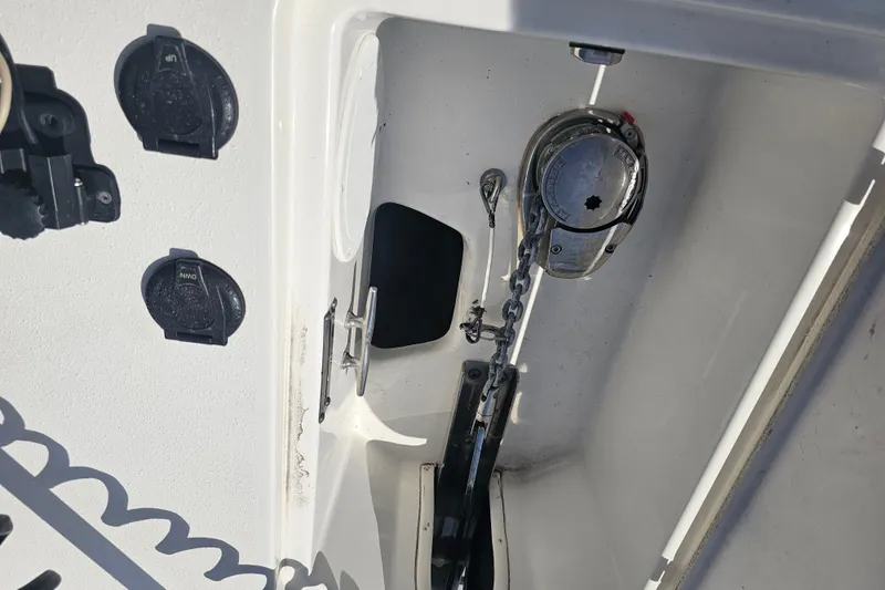 Slide: The Image of 2022 NauticStar 28 XS boat interior with spacious seating and modern design. - 14