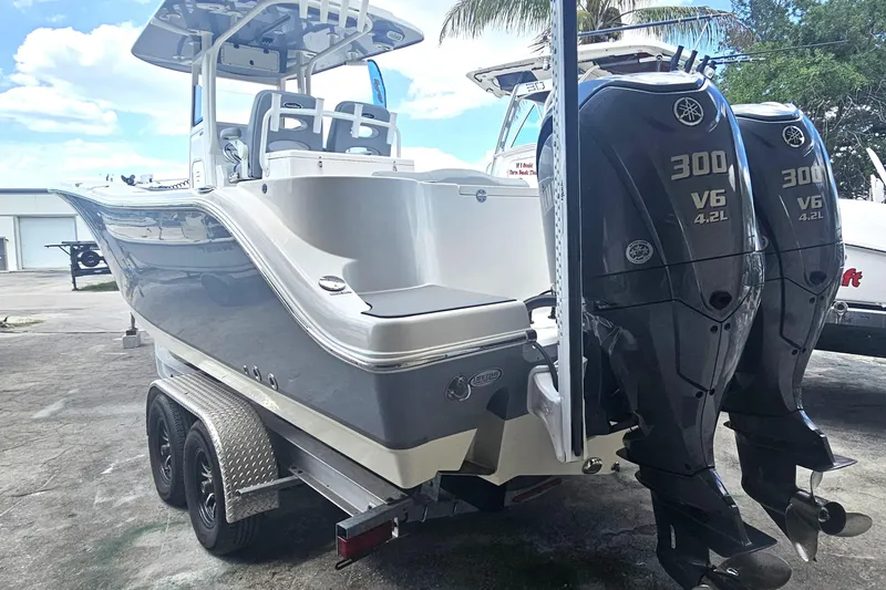 Slide: The Image of Manufacturer Provided Image: 2022 NauticStar 28 XS boat interior with seating and storage. - 20