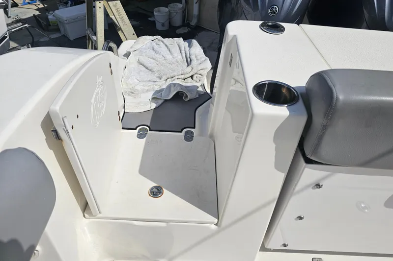 Slide: The Image of Interior of 2022 NauticStar 28 XS boat bathroom with toilet and sink. - 30