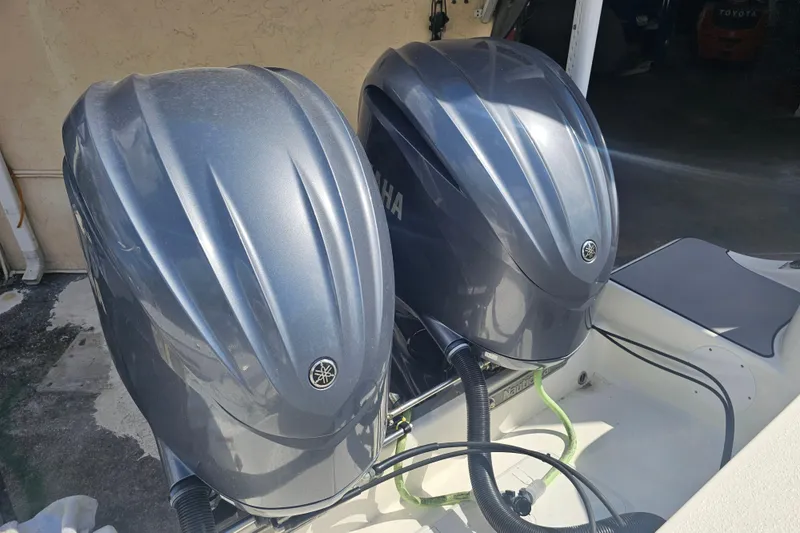 Slide: The Image of 2022 NauticStar 28 XS boat interior with seating and storage compartments. - 31