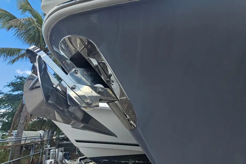 Slide: The Image of 2022 NauticStar 28 XS boat with dual Yamaha 300 V6 engines on a trailer. - 6