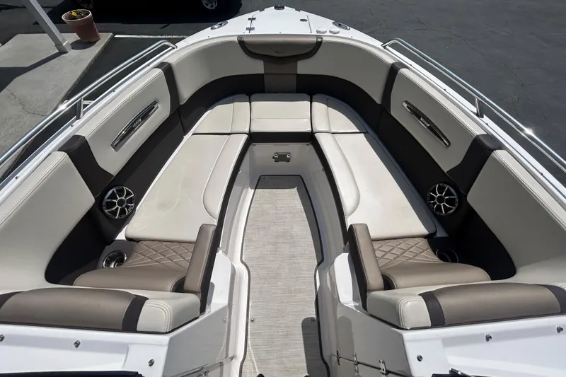 Slide: The Image of 2018 Chaparral 267 SSX boat interior with luxurious seating and modern design. - 16