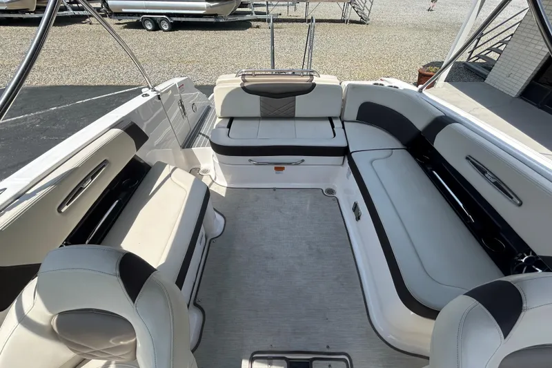 Slide: The Image of 2018 Chaparral 267 SSX boat interior with spacious seating and modern design. - 8