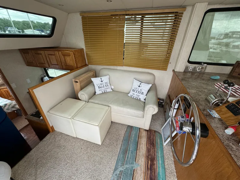 Slide: The Image of Interior of 2008 Holiday Mansion 37 boat with cozy seating and nautical decor. - 16