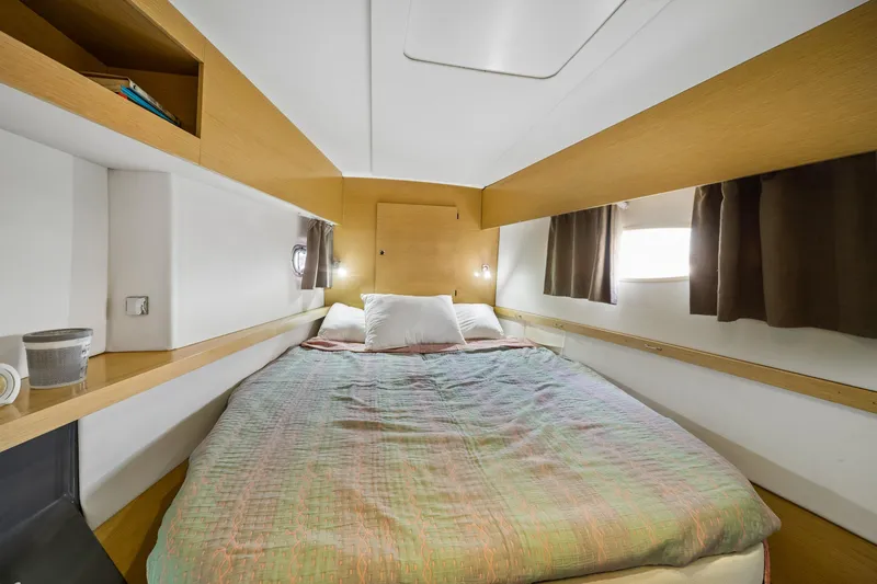 Slide: The Image of Cozy cabin interior of 2014 Fountaine Pajot Helia 44 catamaran with comfortable bed. - 24