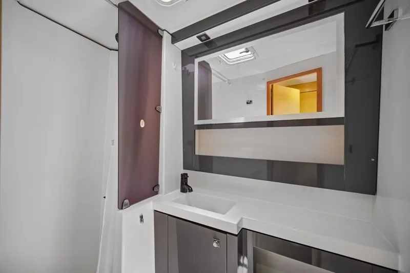 Slide: The Image of Modern bathroom interior on 2014 Fountaine Pajot Helia 44 catamaran, featuring sleek design elements. - 32