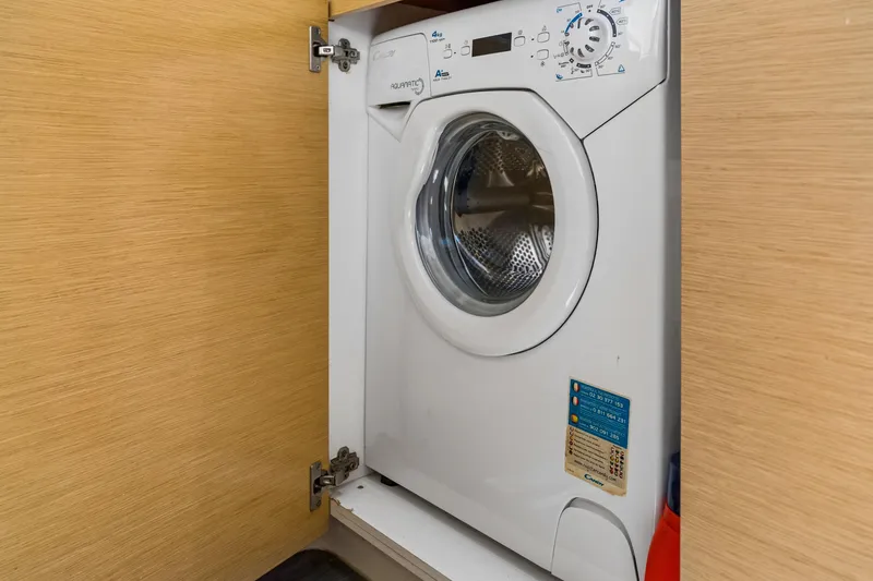 Slide: The Image of Washing machine inside a cabinet on a 2014 Fountaine Pajot Helia 44 yacht. - 36