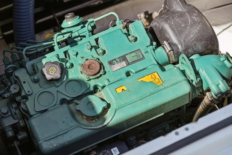 Slide: The Image of Engine of a 2014 Fountaine Pajot Helia 44 catamaran, showcasing mechanical components. - 39